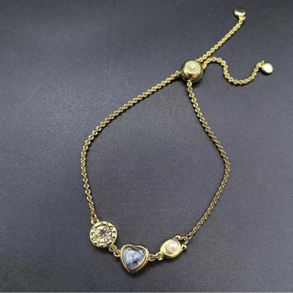 COACH Gold Heart Charm Bracelet